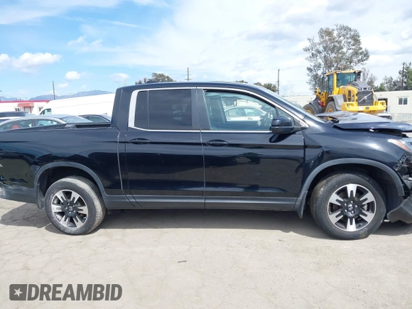 2020 Honda Ridgeline RTL with VIN 5FPYK3F53LB030107, listed as a IAAI auction lot 41933517 with 93,373 mi miles and . Bid and sale history available at DreamBid. Image 13.