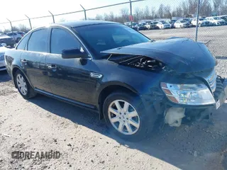 2009 Ford Taurus SE with VIN 1FAHP23W99G109819, listed as a IAAI auction lot 41683012 with 157,202 mi miles. Bid and sale history available at carsss.com. Image 1.