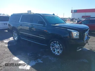 2016 GMC Yukon XL SLT with VIN 1GKS2GKC0GR443634, listed as a IAAI auction lot 41379064 with 121,744 mi miles. Bid and sale history available at carsss.com. Image 1.