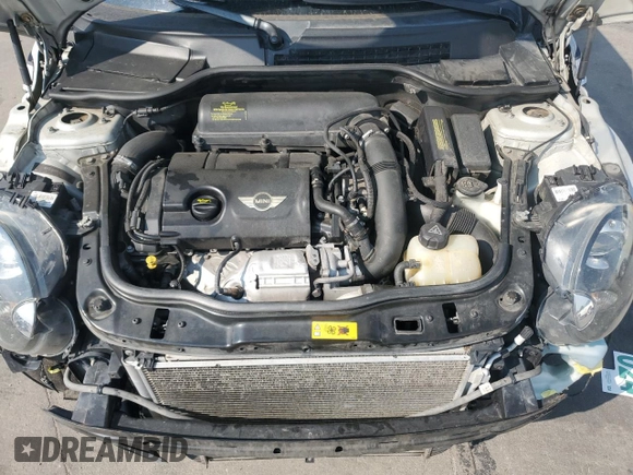 2012 MINI Convertible S z VIN WMWZP3C51CT296464, wystawiony jako Copart lot #64290005 z przebiegiem 107 580 mil mil oraz Szkoda całkowita • Salvage title. Historia ofert i sprzedaży dostępna na DreamBid. Obrazek 11.