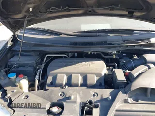 2012 Honda Odyssey EX-L with VIN 5FNRL5H6XCB016801, listed as a IAAI auction lot 42112141 with 164,671 mi miles and . Bid and sale history available at carsss.com. Image 10.