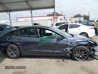 2023 Tesla Model 3 with VIN 5YJ3E1EA0PF518904, listed as a IAAI auction lot 42058540 with 20,945 mi miles and . Bid and sale history available at DreamBid. Image 12.