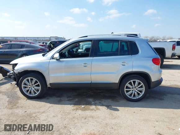 2013 Volkswagen Tiguan SE with VIN WVGAV7AX4DW545658, listed as a IAAI auction lot 41523168 with 188,729 mi miles and . Bid and sale history available at DreamBid. Image 15.