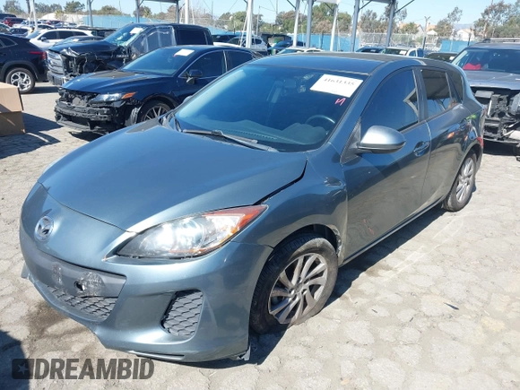2012 Mazda 3 i Touring with VIN JM1BL1L89C1577535, listed as a IAAI auction lot 41631335 with 82,984 mi miles and . Bid and sale history available at DreamBid. Image 2.