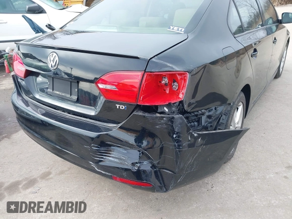 2012 Volkswagen Jetta TDI w/Premium with VIN 3VWLL7AJXCM073394, listed as a IAAI auction lot 41602574 with 159,668 mi miles and . Bid and sale history available at DreamBid. Image 17.
