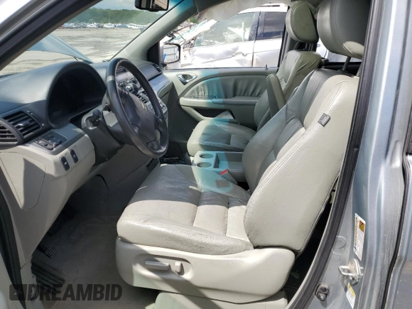 2010 Honda Odyssey EX-L с VIN 5FNRL3H79AB073307, выставлен на аукционе Copart как лот 55642225 с пробегом Не указан миль и Списание • Salvage title. История ставок и продаж доступна на DreamBid. Изображение 7.