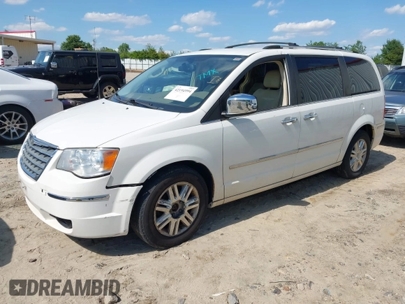 2010 Chrysler Town & Country Limited with VIN 2A4RR7DX2AR322525, listed as a IAAI auction lot 42194994 with 180,727 mi miles and . Bid and sale history available at carsss.com. Image 2.
