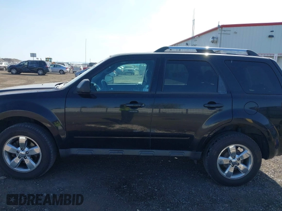 2010 Ford Escape Limited z VIN 1FMCU9E74AKB24589, wystawiony jako IAAI lot #42119996 z przebiegiem 154 745 mil mil oraz . Historia ofert i sprzedaży dostępna na DreamBid. Obrazek 14.