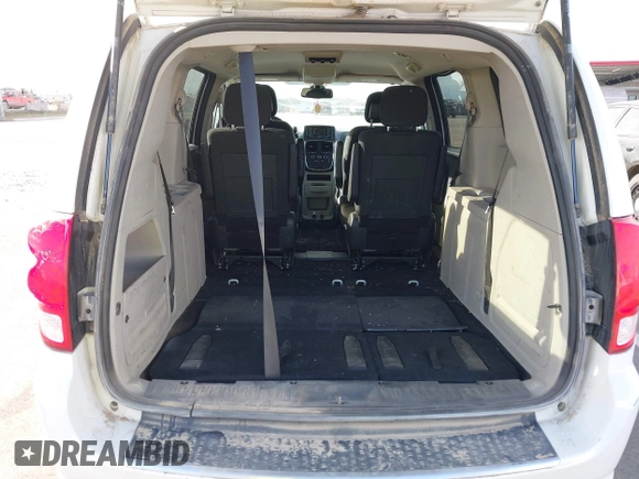 2019 Dodge Grand Caravan SE with VIN 2C4RDGBGXKR682747, listed as a IAAI auction lot 41840067 with 176,446 mi miles and . Bid and sale history available at DreamBid. Image 18.