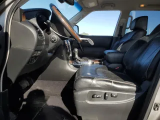 2012 Infiniti QX56 7-passenger with VIN JN8AZ2NE2C9021091, listed as a Copart auction lot 52217325 with 293,275 mi miles and Clean Title. Bid and sale history available at carsss.com. Image 7.