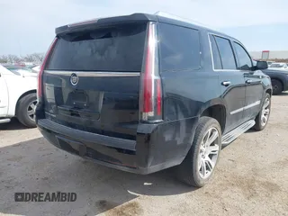 2015 Cadillac Escalade Luxury z VIN 1GYS4BKJ2FR260848, wystawiony jako IAAI lot #41895938 z przebiegiem 157 531 mil mil oraz . Historia ofert i sprzedaży dostępna na DreamBid. Obrazek 4.