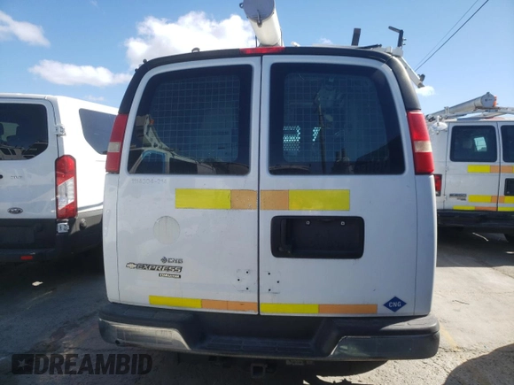 2014 Chevrolet Express Cargo Van with VIN 1GCWGFCB0E1133140, listed as a Copart auction lot 45433475 with 63,580 mi miles and Clean Title. Bid and sale history available at carsss.com. Image 6.
