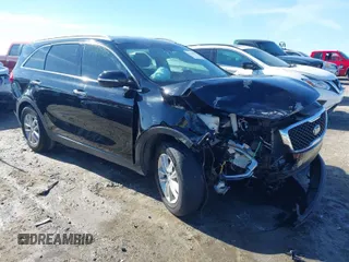 2017 Kia Sorento LX V6 with VIN 5XYPG4A56HG227811, listed as a IAAI auction lot 41427871 with 144,467 mi miles. Bid and sale history available at carsss.com. Image 1.