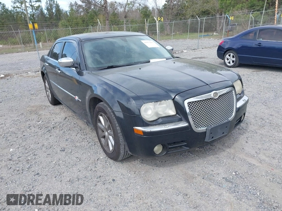 2006 Chrysler 300 C with VIN 2C3KA63H36H455735, listed as a IAAI auction lot 41875033 with 175,251 mi miles. Bid and sale history available at carsss.com. Image 1.