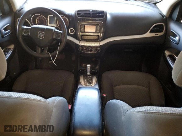 2014 Dodge Journey American Value with VIN 3C4PDCAB2ET301688, listed as a Copart auction lot 54731275 with 108,064 mi miles and Salvage Title. Bid and sale history available at DreamBid. Image 8.