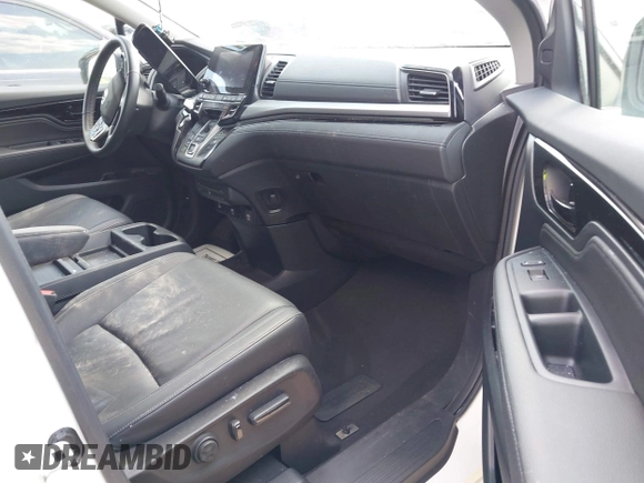 2023 Honda Odyssey Touring with VIN 5FNRL6H8XPB038875, listed as a IAAI auction lot 42441076 with 13,947 mi miles and . Bid and sale history available at DreamBid. Image 5.