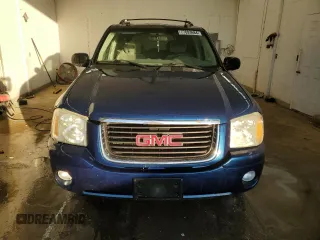 2005 GMC Envoy SLT with VIN 1GKDS13S652339845, listed as a Copart auction lot 77693684 with 220,306 mi miles and Salvage Title. Bid and sale history available at carsss.com. Image 5.