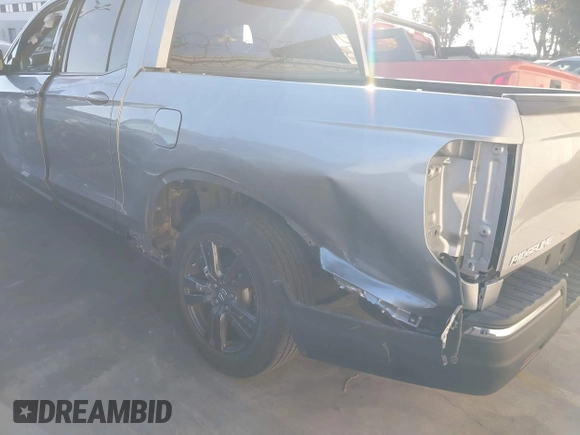 2018 Honda Ridgeline Sport with VIN 5FPYK2F19JB000713, listed as a IAAI auction lot 41300244 with 52,119 mi miles and . Bid and sale history available at DreamBid. Image 6.