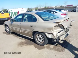 2001 Pontiac Grand Am SE1 with VIN 1G2NF52T01C232451, listed as a IAAI auction lot 41629388 with 152,299 mi miles. Bid and sale history available at carsss.com. Image 3.