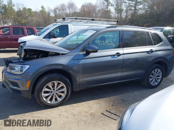 2019 Volkswagen Tiguan S with VIN 3VV0B7AX0KM119702, listed as a IAAI auction lot 42069676 with 69,637 mi miles and . Bid and sale history available at DreamBid. Image 14.