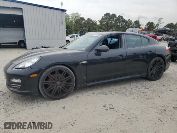2011 Porsche Panamera z VIN WP0AA2A77BL013970, wystawiony jako Copart lot #52149445 z przebiegiem 165 926 mil mil oraz Czysty tytuł • Clean title. Historia ofert i sprzedaży dostępna na DreamBid. Obrazek 1.