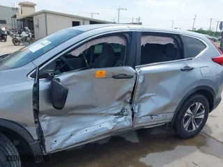 2017 Honda CR-V LX with VIN 7FARW5H38HE014201, listed as a IAAI auction lot 42044460 with 82,174 mi miles. Bid and sale history available at carsss.com. Image 6.