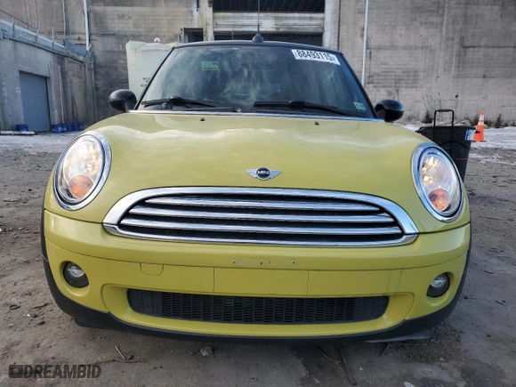 2009 MINI Cooper Convertible with VIN WMWMR33549TU95327, listed as a Copart auction lot 88493115 with 76,714 mi miles and Salvage Title. Bid and sale history available at carsss.com. Image 5.
