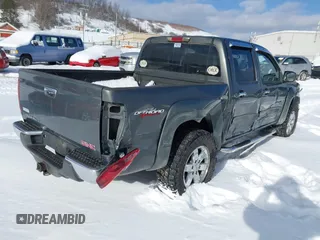 2010 GMC Canyon SLE1 with VIN 1GTJTCDE6A8127051, listed as a IAAI auction lot 41366245 with 147,516 mi miles. Bid and sale history available at carsss.com. Image 4.