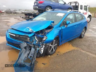 2023 Subaru Impreza Premium with VIN 4S3GTAV62P3707442, listed as a IAAI auction lot 41509344 with 25,489 mi miles and . Bid and sale history available at DreamBid. Image 2.