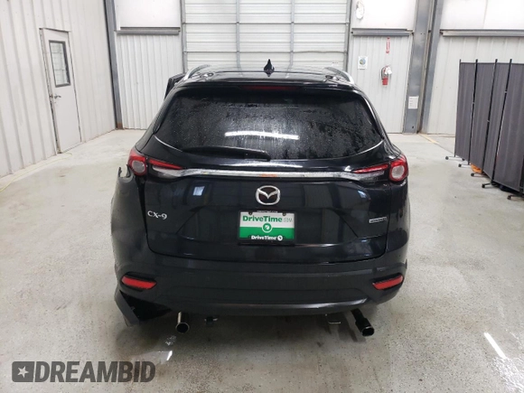 2021 Mazda CX-9 Touring with VIN JM3TCACY4M0523188, listed as a Copart auction lot 48595205 with 99,999 mi miles and Clean title. Bid and sale history available at DreamBid. Image 6.