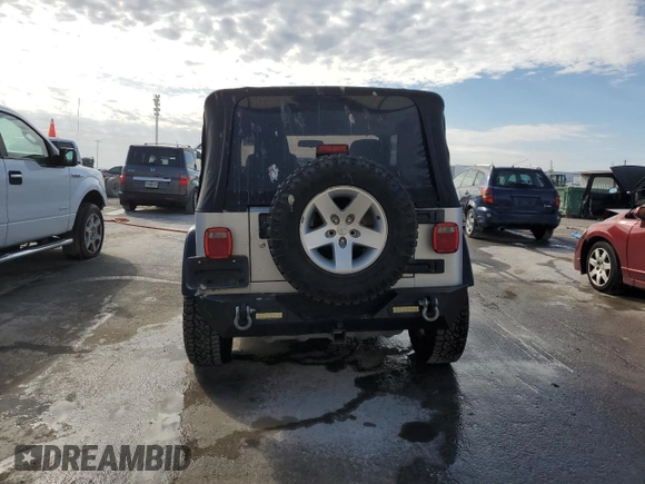 2005 Jeep Wrangler Rubicon with VIN 1J4FA69S75P383071, listed as a Copart auction lot 86371504 with 92,951 mi miles and Salvage Title. Bid and sale history available at carsss.com. Image 6.