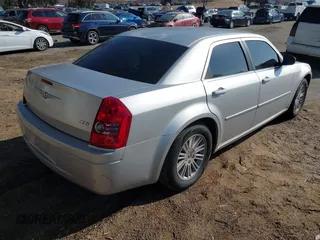 2009 Chrysler 300 LX with VIN 2C3KA43D29H528728, listed as a IAAI auction lot 41532893 with 95,077 mi miles. Bid and sale history available at carsss.com. Image 4.