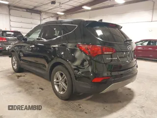 2017 Hyundai Santa Fe 2.4L with VIN 5NMZUDLBXHH041621, listed as a IAAI auction lot 42194586 with 91,012 mi miles and . Bid and sale history available at DreamBid. Image 3.