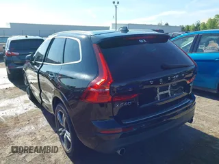 2018 Volvo XC60 Momentum with VIN YV4A22RK3J1040015, listed as a IAAI auction lot 42098399 with 57,130 mi miles and . Bid and sale history available at DreamBid. Image 3.