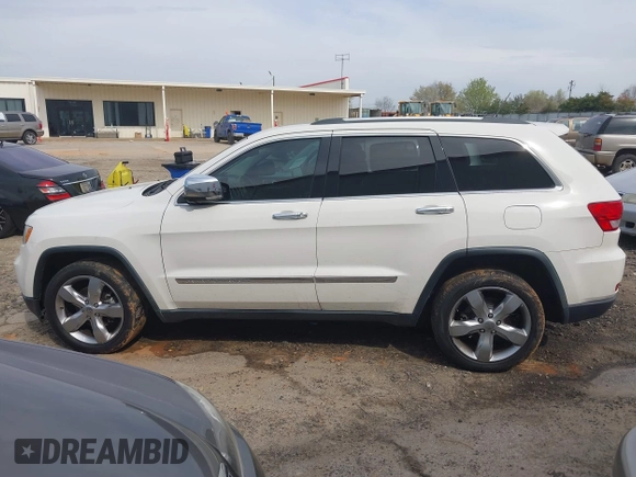 2012 Jeep Grand Cherokee Overland with VIN 1C4RJECT5CC362349, listed as a IAAI auction lot 41760221 with 218,350 mi miles. Bid and sale history available at carsss.com. Image 14.