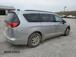 2021 Chrysler Voyager LXi with VIN 2C4RC1DG0MR521145, listed as a Copart auction lot 48062405 with 144,197 mi miles and Salvage Title. Bid and sale history available at DreamBid. Image 3.