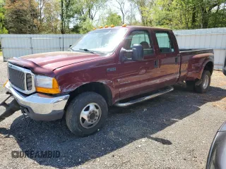 2000 Ford F-350 XL z VIN 1FTWW33F4YEB82083, wystawiony jako Copart lot #55274155 z przebiegiem 181 629 mil mil oraz Szkoda całkowita • Salvage title. Historia ofert i sprzedaży dostępna na DreamBid. Obrazek 1.