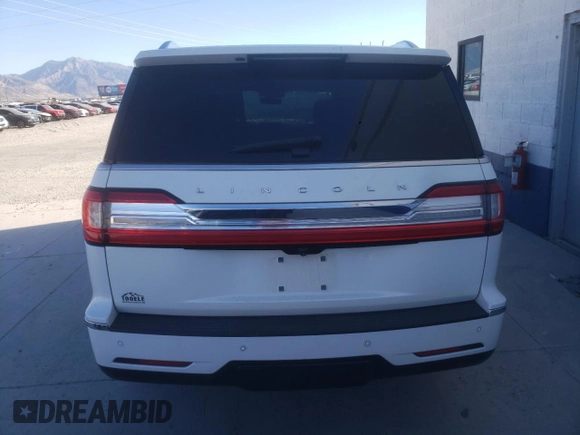 2020 Lincoln Navigator with VIN 5LMJJ2NT0LEL07488, listed as a Copart auction lot 73396634 with Not provided miles and Salvage title. Bid and sale history available at DreamBid. Image 6.