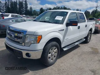 2014 Ford F-150 XL with VIN 1FTFW1ETXEFD14681, listed as a IAAI auction lot 42650184 with 133,873 mi miles and . Bid and sale history available at DreamBid. Image 2.