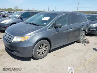 2012 Honda Odyssey EX-L with VIN 5FNRL5H64CB131197, listed as a IAAI auction lot 41829107 with 215,115 mi miles. Bid and sale history available at carsss.com. Image 2.