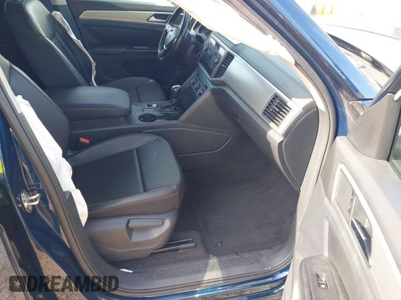 2018 Volkswagen Atlas SE with VIN 1V2CR2CA1JC561003, listed as a IAAI auction lot 42556798 with 124,147 mi miles and . Bid and sale history available at DreamBid. Image 5.