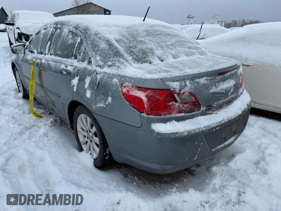 2010 Chrysler Sebring Touring with VIN 1C3CC4FB1AN135341, listed as a Copart auction lot 82492404 with Not Provided miles and Salvage Title. Bid and sale history available at carsss.com. Image 2.