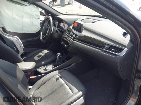 2018 BMW X1 xDrive28i with VIN WBXHT3C30J5L34702, listed as a IAAI auction lot 41935803 with 42,174 mi miles. Bid and sale history available at carsss.com. Image 5.