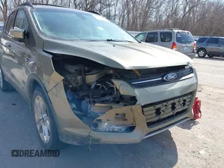 2013 Ford Escape SEL с VIN 1FMCU9HX4DUC34174, выставлен на аукционе IAAI как лот 41781517 с пробегом Не указан миль и . История ставок и продаж доступна на DreamBid. Изображение 6.