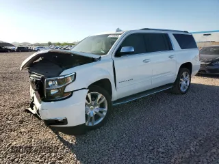 2017 Chevrolet Suburban Premier with VIN 1GNSKJKC1HR237806, listed as a Copart auction lot 61485965 with 75,211 mi miles and Salvage title. Bid and sale history available at DreamBid. Image 1.