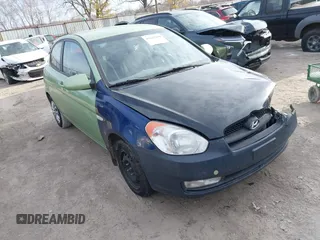 2009 Hyundai Accent Auto SE with VIN KMHCN36C69U112207, listed as a IAAI auction lot 41641298 with 166,804 mi miles. Bid and sale history available at carsss.com. Image 1.