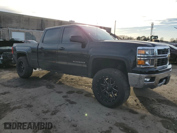 2015 Chevrolet Silverado 1500 LT with VIN 3GCUKREC9FG142578, listed as a Copart auction lot 44142905 with 194,369 mi miles and Salvage Title. Bid and sale history available at DreamBid. Image 4.