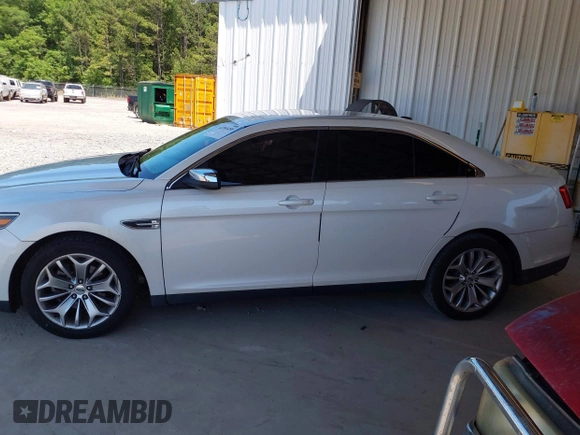 2015 Ford Taurus Limited z VIN 1FAHP2F89FG101017, wystawiony jako IAAI lot #42284459 z przebiegiem 183 167 mil mil oraz . Historia ofert i sprzedaży dostępna na DreamBid. Obrazek 14.