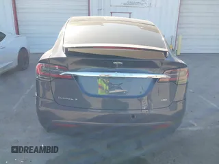 2018 Tesla Model X 75D with VIN 5YJXCDE28JF142509, listed as a IAAI auction lot 41993444 with 100,244 mi miles and . Bid and sale history available at carsss.com. Image 16.