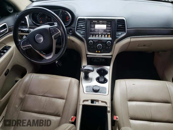 2014 Jeep Grand Cherokee Limited z VIN 1C4RJFBG7EC546642, wystawiony jako Copart lot #61445615 z przebiegiem 128 921 mil mil oraz Szkoda całkowita • Salvage title. Historia ofert i sprzedaży dostępna na DreamBid. Obrazek 8.